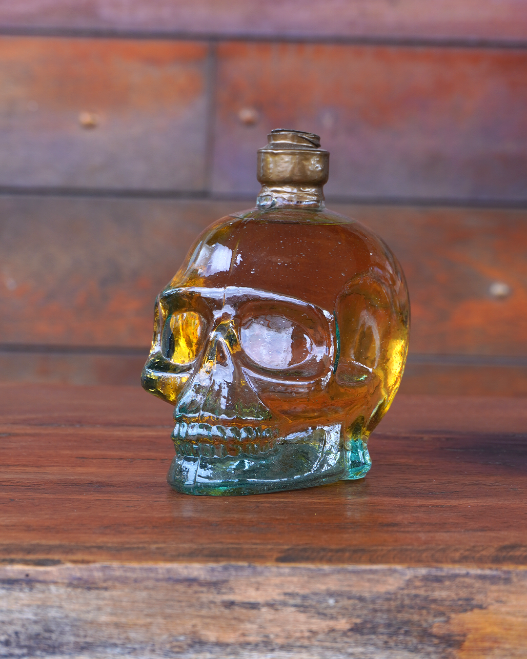 agrupar 19 Garrafa de cachaça em formato de caveira, vista lateral